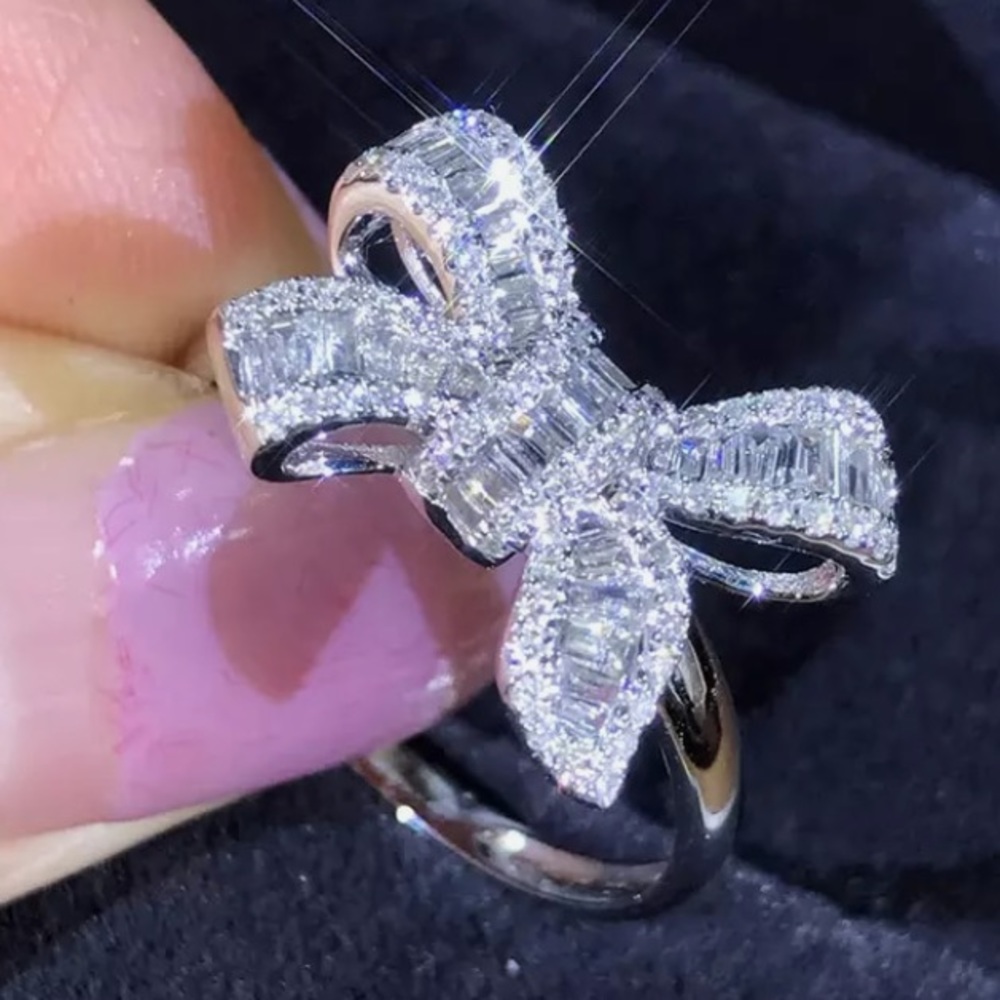 THIS ABSOLUTELY STUNNING PAVE CRYSTALS RING WILL TURN HEADS WHEREVER YOU WEAR IT